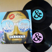 Front Facing Side A and B records in Teal and Pink.